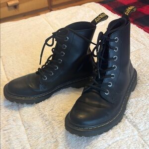 Dr. Martens Black Combat Boots with High-Top Design and Sturdy Sole
